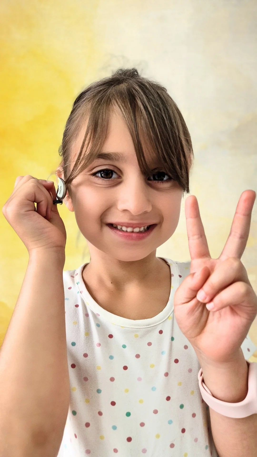 Defne işitme cihazıyla
